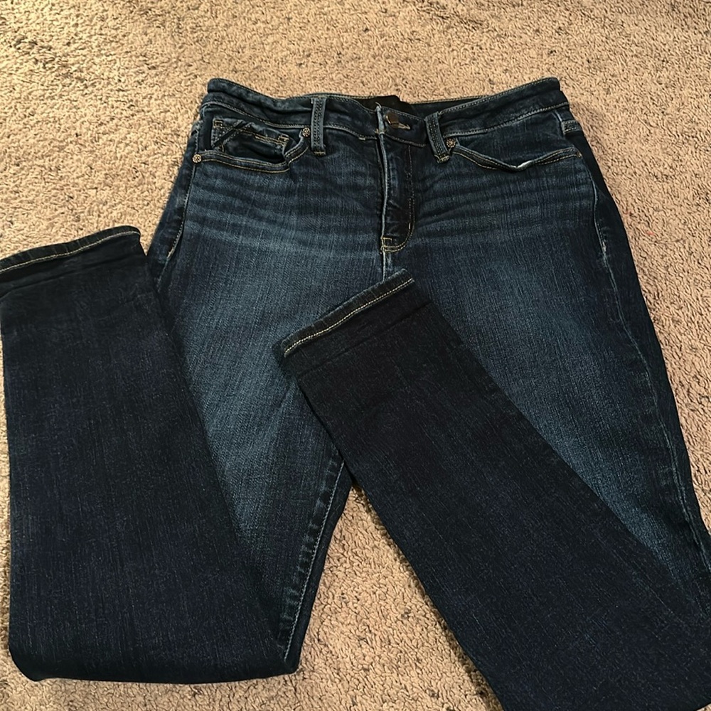 Buckle black skinny jeans